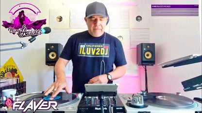 DJ performing at a turntable with 'Flaver' branding in the background