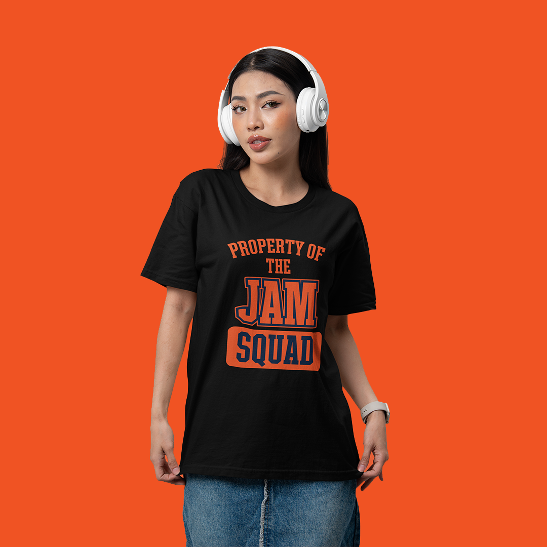 Person wearing a black t-shirt with 'Property of the Jam Squad' text on an orange background