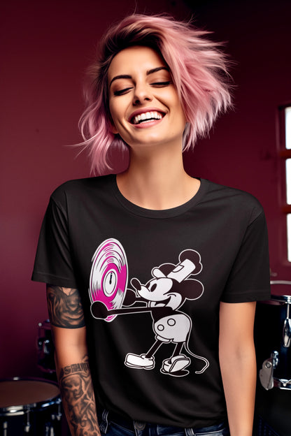 Woman wearing a black t-shirt with a graphic design, smiling against a red background.